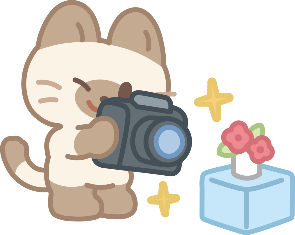 写真を撮る猫のイラスト